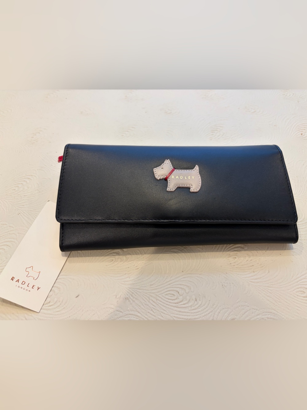 Radley London 
Model: Heritage Large Flapover Matinee Wallet